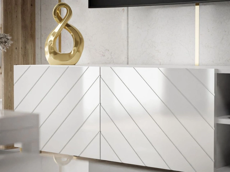 Szafka RTV w stylu glamour z frezowanymi frontami i złotymi nóżkami Vionel biały połysk